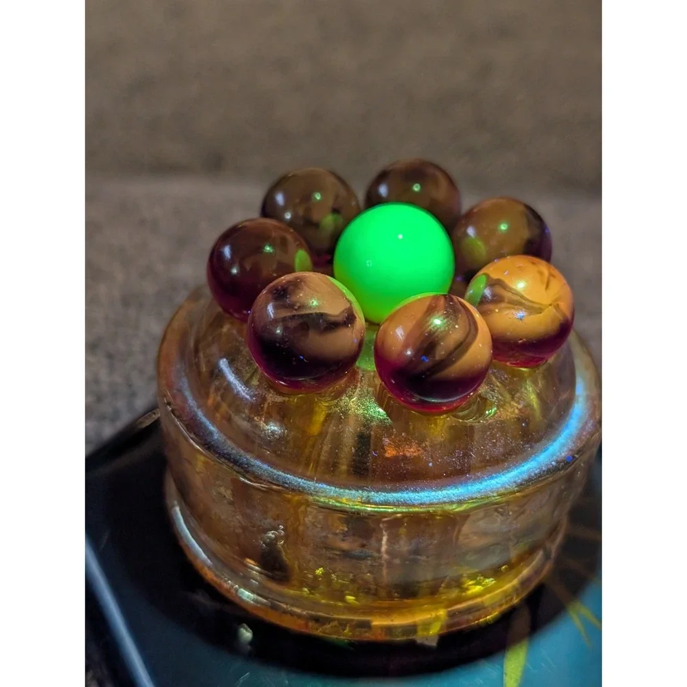 7 Red Cadmium Marbles W/ 1 Burmese Marble On VTG Flower Frog. (Included)